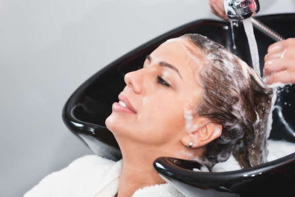 hairdresser Hair washing by hairdresser in beauty salon - Photo, Image