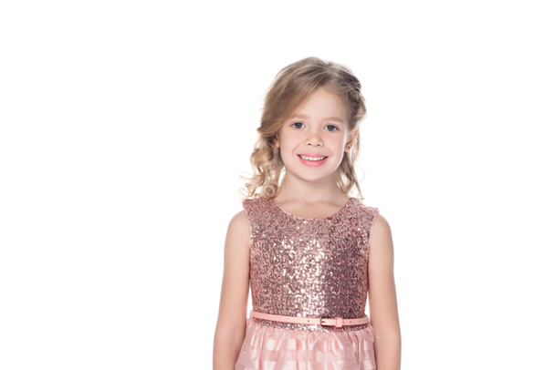 beautiful smiling child in pink dress, isolated on white  - Foto, afbeelding