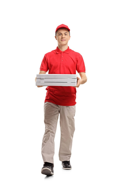 Teenage pizza delivery boy walking  - Φωτογραφία, εικόνα