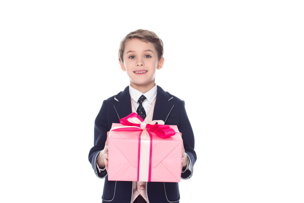 little boy holding gift box, isolated on white - Photo, Image