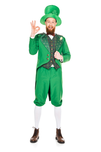 handsome leprechaun in green suit and hat with ok sign, isolated on white - Foto, afbeelding