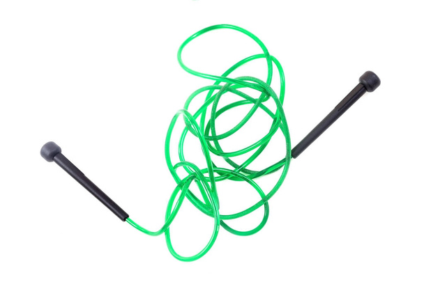 green Jumping rope for sort training on white background - Zdjęcie, obraz