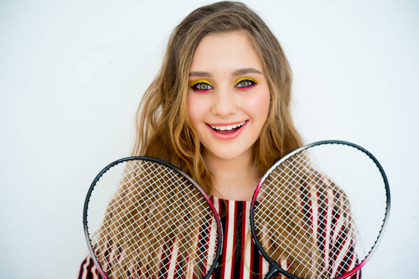 Girl with a badminton racket - Фото, зображення