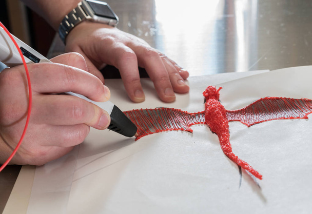 3-D printing pen creating a dragon shape - Photo, Image