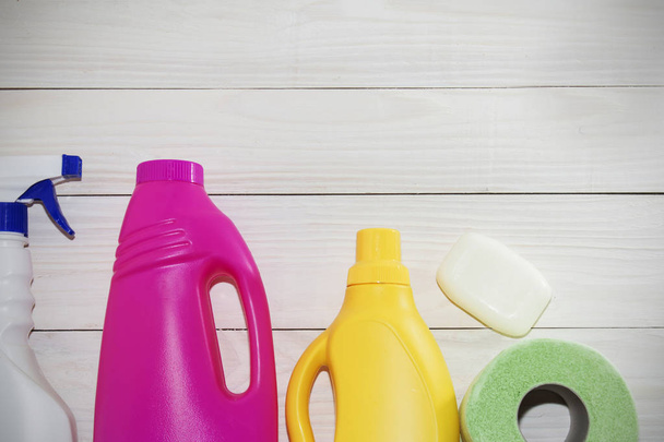 detergents bottles, on wooden background light. - Photo, Image