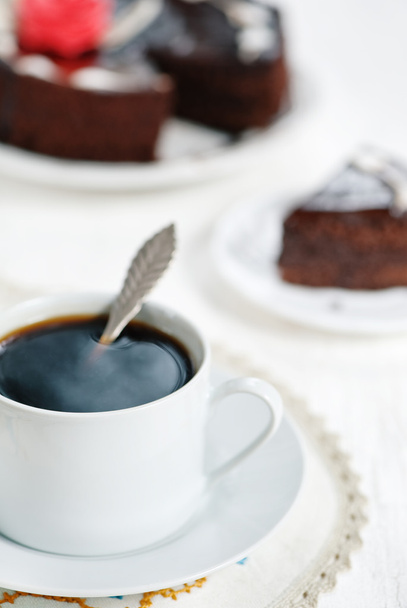 Cup of coffee and chocolate cake - Fotoğraf, Görsel