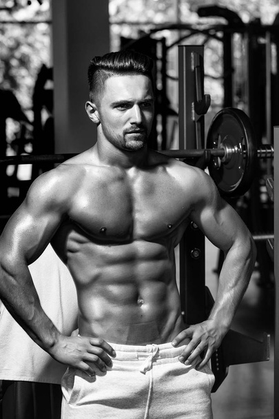 muscular man with barbell - Fotó, kép