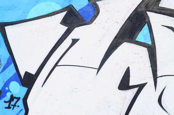 Фонове зображення бетонної стіни зі шматочком абстрактного графіті. Вуличне мистецтво, вандалізм та молодіжні захоплення
 - Фото, зображення