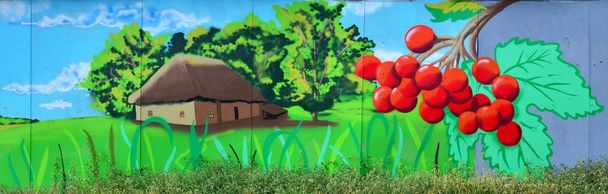 A régi falra festett színes graffiti rajz a festékek aeroszol. A a hagyományos ukrán képe táj, napraforgó, kalina és a malom, a mező - Fotó, kép