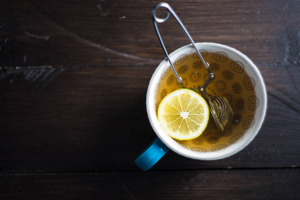 Egy csésze tea citrommal. - Fotó, kép