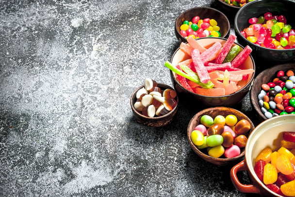 Multicolored candy, jelly and marshmallows in a bowl. - Fotografie, Obrázek