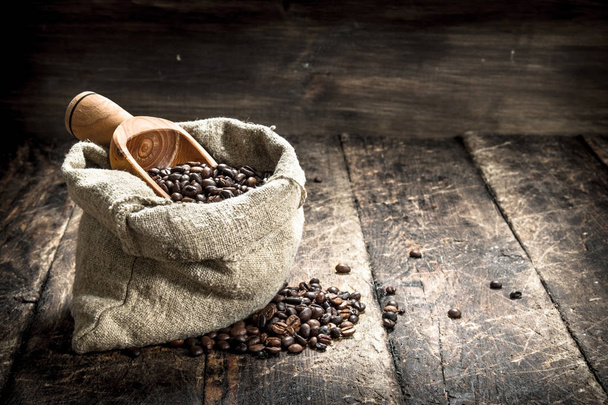 Grain coffee in a bag. - Photo, Image