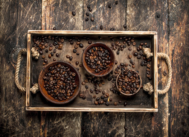 Coffee beans in bowls on a tray. - Photo, Image