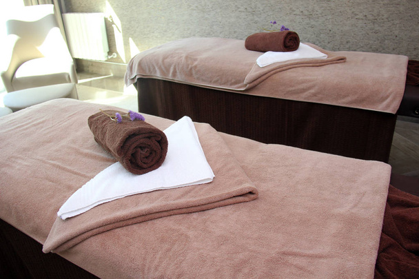 Cosy massage treatment tables. - Photo, Image