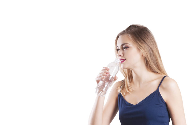 sporty girl with a bottle of water - Fotografie, Obrázek
