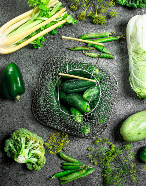 Organic green food. Fresh vegetables and herbs. - Фото, изображение