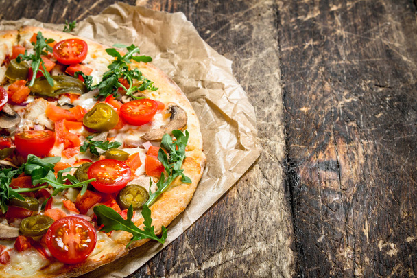 fresh pizza with tomatoes and greens. - Photo, Image