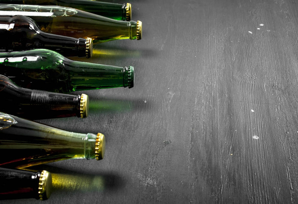 Bottles with fresh beer. - Photo, image