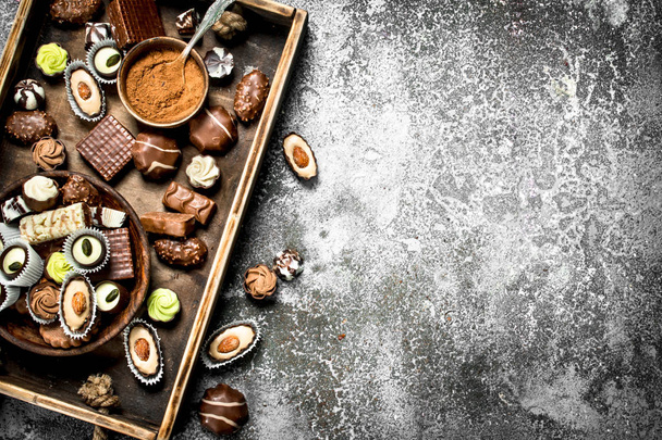 Chocolate sweets with cocoa powder. - Zdjęcie, obraz