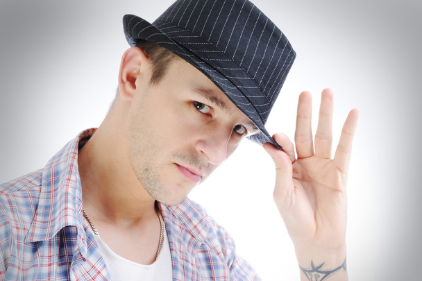Trendy handsome young man with hat, iso - Φωτογραφία, εικόνα