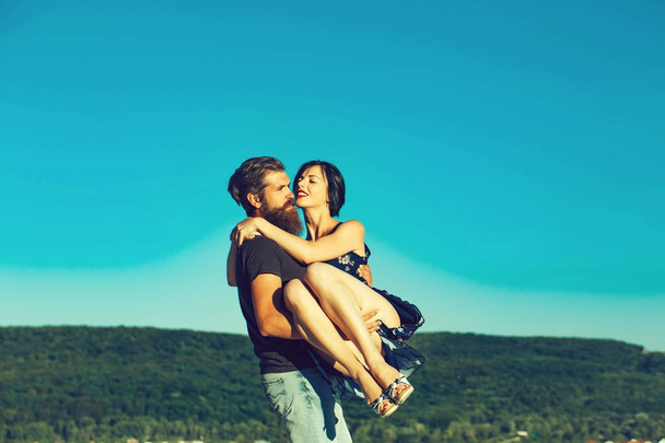 young couple on blue sky - Foto, Imagem