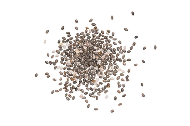 Algunas semillas de chía sobre fondo blanco
 - Foto, Imagen