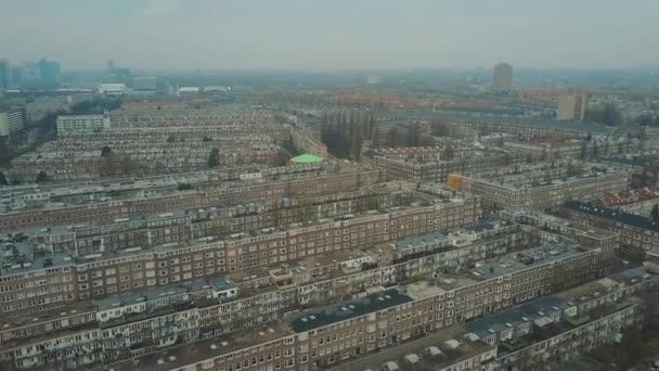Aerial shot of typical apartment buildings in Amsterdam, Netherlands - Filmati, video