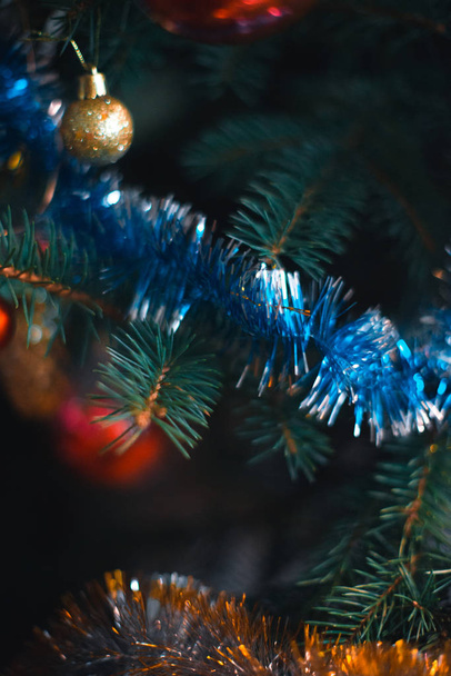 Christmas tree decorations with a blurred background on a Christmas tree. - Photo, Image