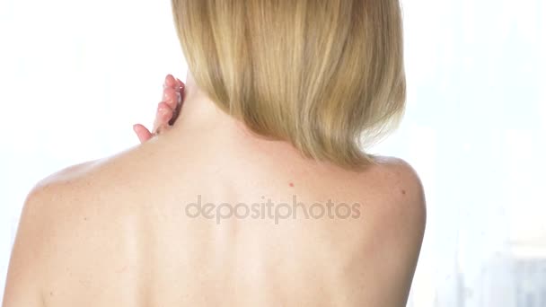 Shoulder and woman back body lotion spreading slow motion close-up, 4k - Video