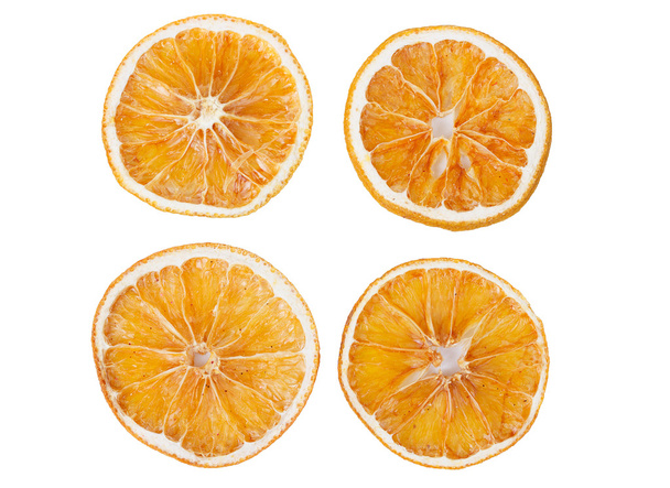 Four dried slices of orange - Photo, Image