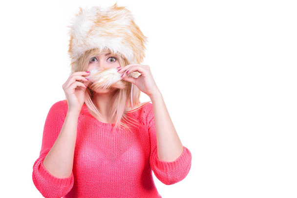Attractive woman wearing furry winter hat - Photo, Image