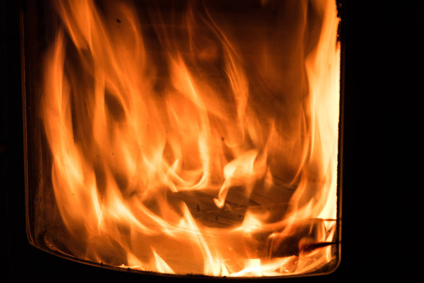 fuego de estufa ardiente - llama de primer plano
 - Foto, imagen