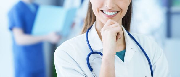 Smiling female doctor - Фото, зображення