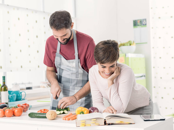 Couple preparing lunch together at home - Photo, Image