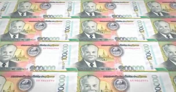 Banknoty z kip laotański sto tysięcy Laosu toczenia, pieniądze, pętla - Materiał filmowy, wideo