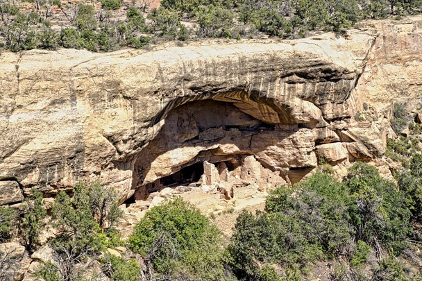 Mesa verde Milli Parkı ve dünya mirası uçurum konutlar yaşadığı eski Anasazi Pueblo insanlar üzerinden mimari hazineleri. - Fotoğraf, Görsel