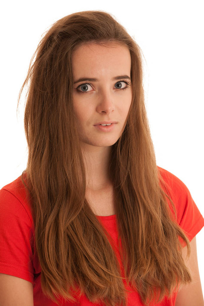 Porträt einer traurigen jungen Frau mit großen Augenbrauen, isoliert über Weiß  - Foto, Bild