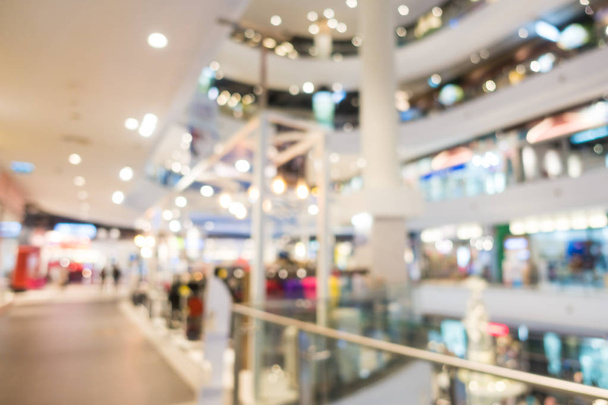 Flou abstrait et centre commercial déconcentré dans l'intérieur des grands magasins pour le fond - Photo, image