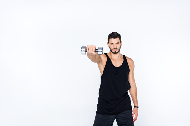 sportive man working out with dumbbell isolated on white - Φωτογραφία, εικόνα