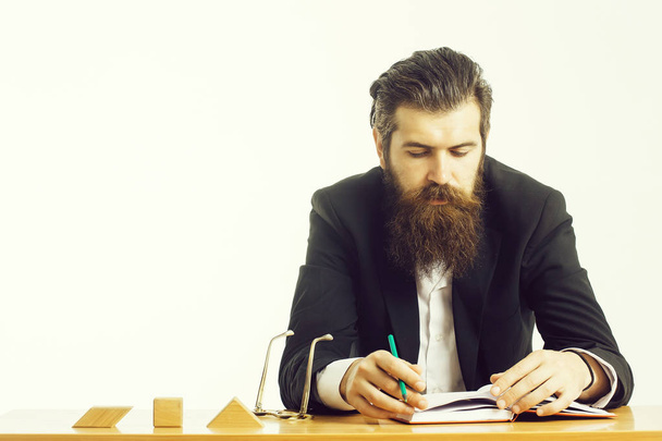bearded man teacher at table - Foto, immagini