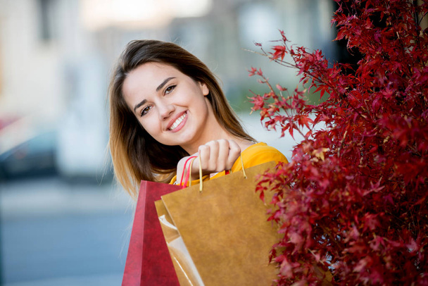 Pretty girl with shopping bags having fun, shopper, shopaholic - Φωτογραφία, εικόνα