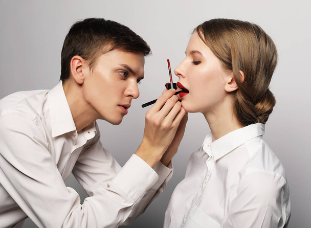 Beauty concept: Make-up artist doing makeup - Fotoğraf, Görsel