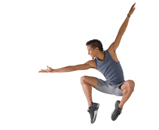 Young man jumping isolated on white - Φωτογραφία, εικόνα