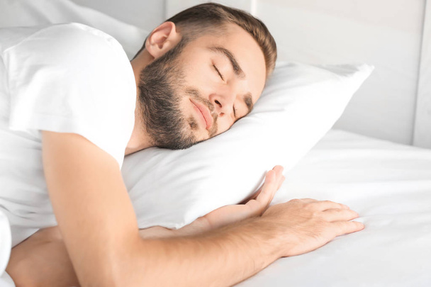 Morning of handsome man sleeping in bed at home - Φωτογραφία, εικόνα
