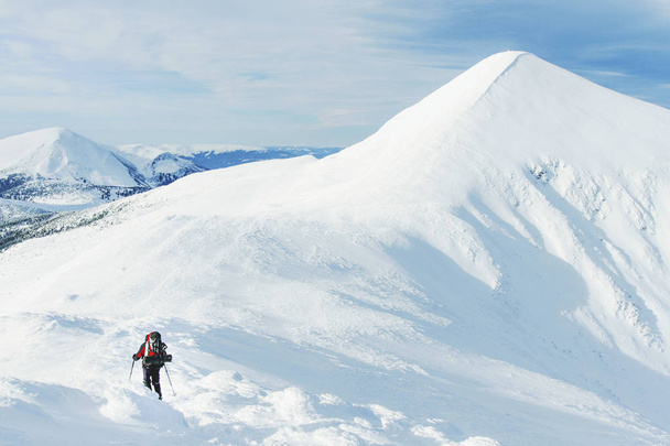 Snowshoe walker running in powder snow with beautiful sunrise li - 写真・画像