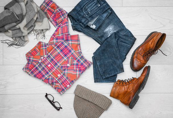 Set of hipster clothes on light background, top view - 写真・画像