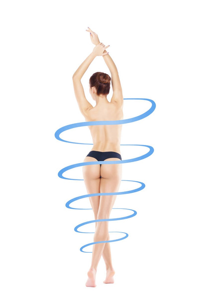 spiral around slim and beautiful body of young woman in lingerie. Weight loss, sports, exercising, water balance, healthy nutrition concept - Fotó, kép