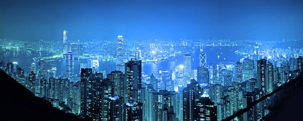 Πανόραμα vire Hongkong cityscape τη νύχτα, πόλη Χονγκ Κονγκ. - Φωτογραφία, εικόνα