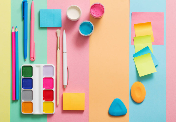 school supplies at  colorful paper background texture - Φωτογραφία, εικόνα