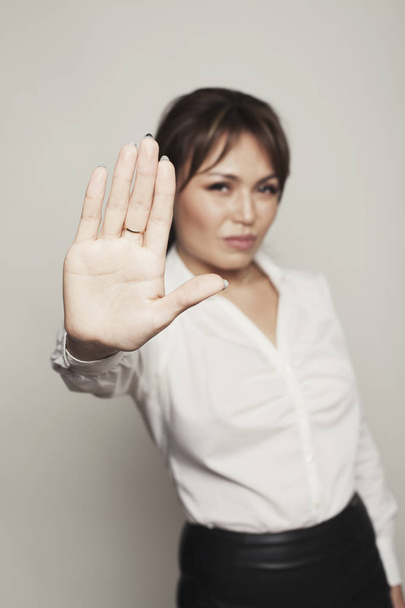 woman business stop hand studio shot photo - Foto, Imagen
